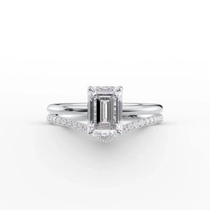 The Low Profile Kamellie Set With A 4.5 Carat Emerald Moissanite
