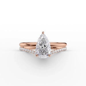 The Low Profile Kamellie Set With A 1.5 Carat Pear Moissanite
