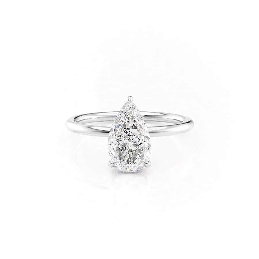 The Low Profile Kamellie Set With A Pear Moissanite