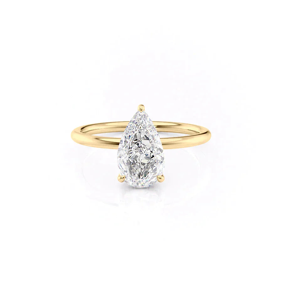 The Low Profile Kamellie Set With A 1.5 Carat Pear Moissanite