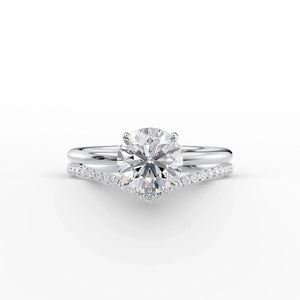 The Low Profile Kamellie Set With A 4.5 Carat Round Moissanite