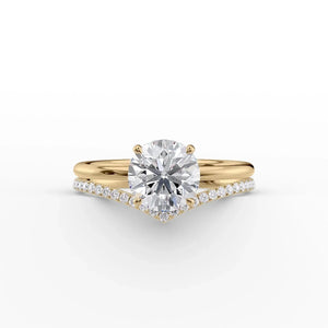 The Low Profile Kamellie Set With A 1.5 Carat Round Moissanite