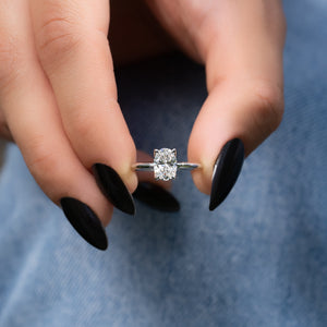 The Petal Kamellie Set With A 2 Carat Oval Lab Diamond