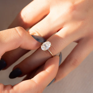 The Petal Kamellie Set With A 2 Carat Oval Lab Diamond