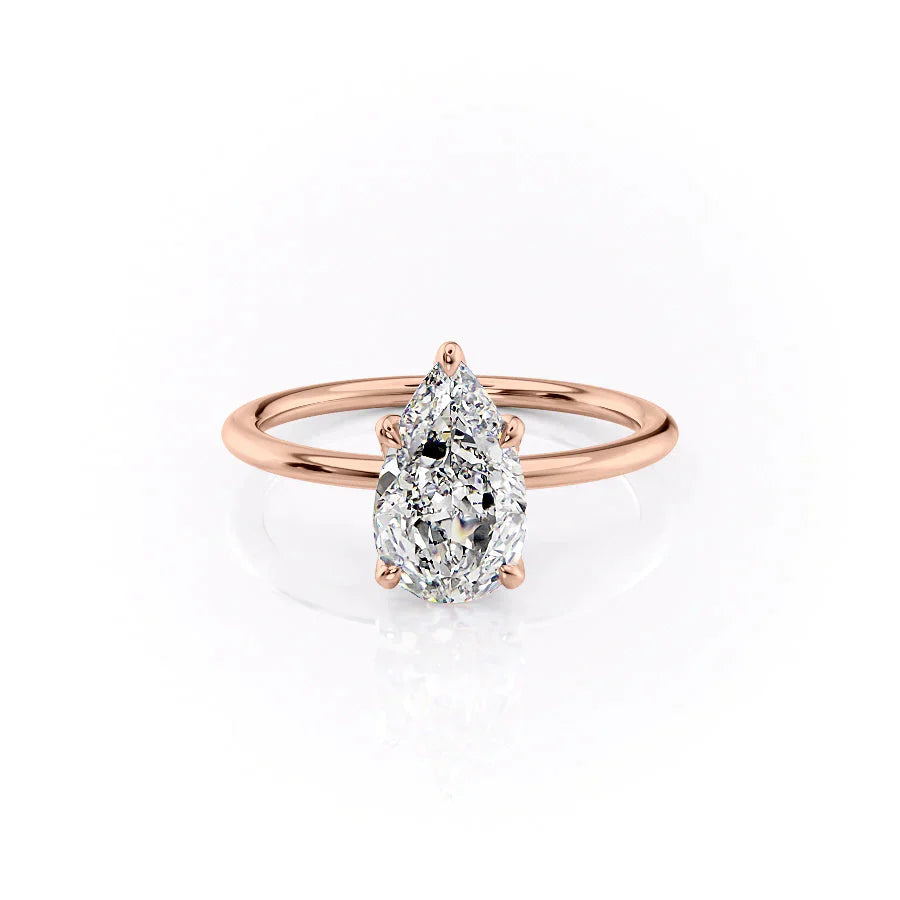 The Petal Kamellie Set With A 1.5 Carat Pear Moissanite