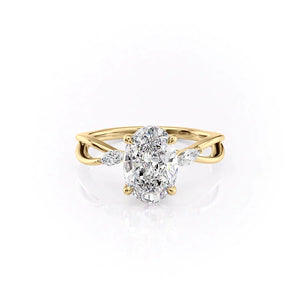 The Kelsey Set With A 1.5 Carat Oval Lab Diamond