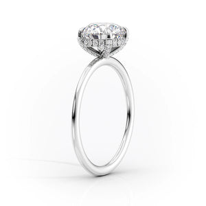 The Crown Kamellie Set With A 1.5 Carat Emerald Moissanite