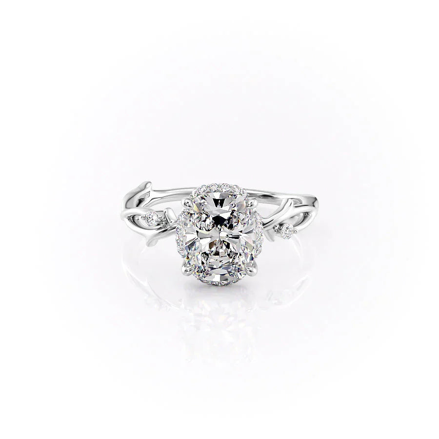 The Halo Twig Set With A 1.5 Carat Elongated Cushion Moissanite