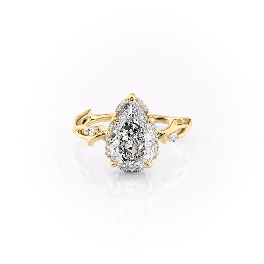 The Halo Twig Set With A 1.5 Carat Pear Moissanite