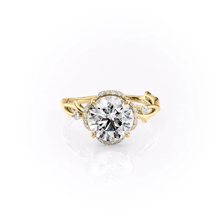 The Halo Twig Set With A 1.5 Carat Round Moissanite
