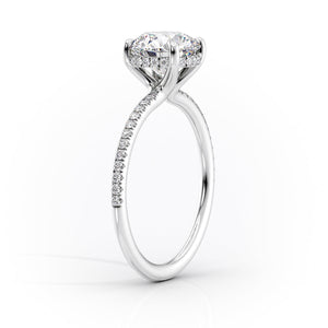 The Pave Sarah Set With A 1.5 Carat Elongated Cushion Moissanite