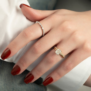 The Lily Set With A 2.5 Carat Elongated Cushion Moissanite