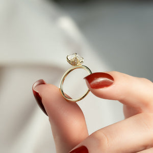 The Lily Set With A 2.5 Carat Elongated Cushion Moissanite