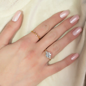 The Three Stone Twig Set With A 2 Carat Round Lab Diamond