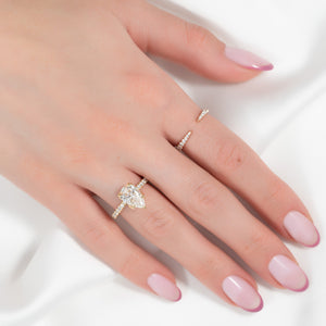 The Pave Lisa Set With A 2 Carat Pear Lab Diamond