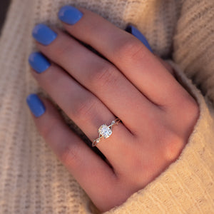 The Three Stone Twig Set With A 2.5 Carat Elongated Cushion Moissanite