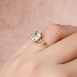 The Three Stone Twig Set With A 2.5 Carat Elongated Cushion Moissanite