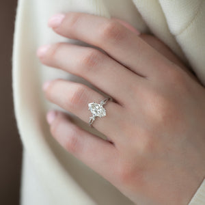 The Three Stone Twig Set With A 1.5 Carat Marquise Moissanite