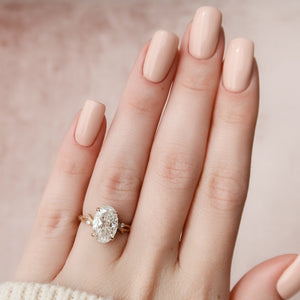 The Textured Twig Set With A 2 Carat Oval Lab Diamond