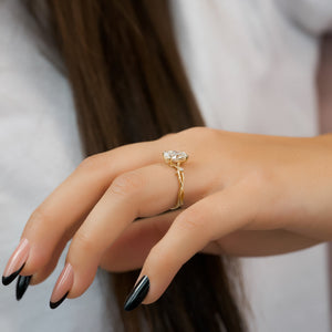 The Textured Twig Set With A 2 Carat Oval Lab Diamond