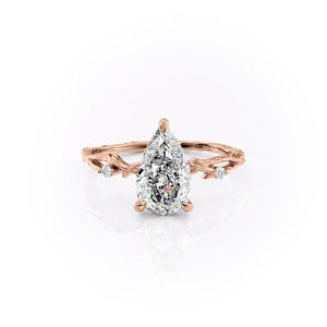 The Textured Twig Set With A Pear Moissanite