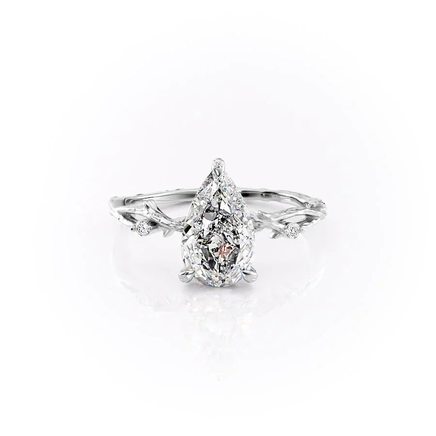 The Textured Twig Set With A Pear Moissanite