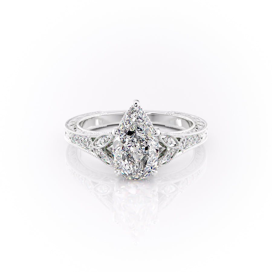 The Violet Set With A 1.5 Carat Pear Moissanite