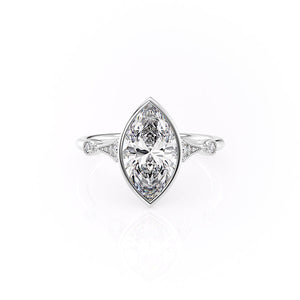 The Bezel Amber Set With A Marquise Moissanite