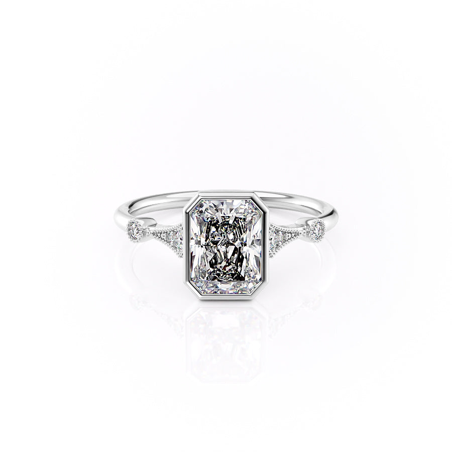The Bezel Amber Set With A 1.5 Carat Radiant Moissanite