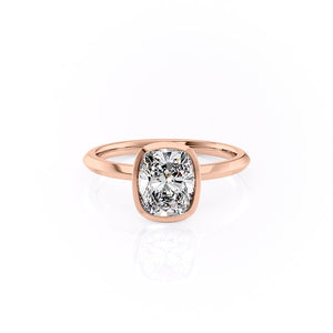 The Razor Bezel Kamellie Set With A 1.5 Carat Elongated Cushion Moissanite