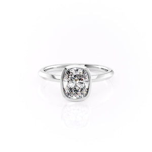 The Razor Bezel Kamellie Set With A Elongated Cushion Moissanite