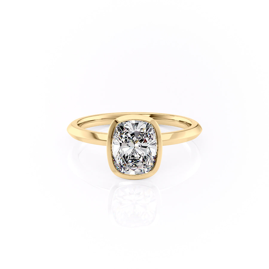 The Razor Bezel Kamellie Set With A 1.5 Carat Elongated Cushion Moissanite