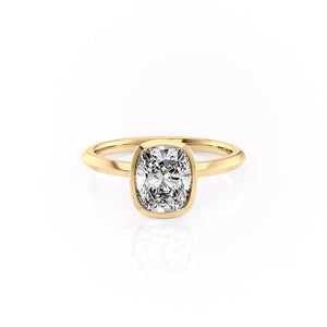 The Razor Bezel Kamellie Set With A 1.5 Carat Elongated Cushion Moissanite