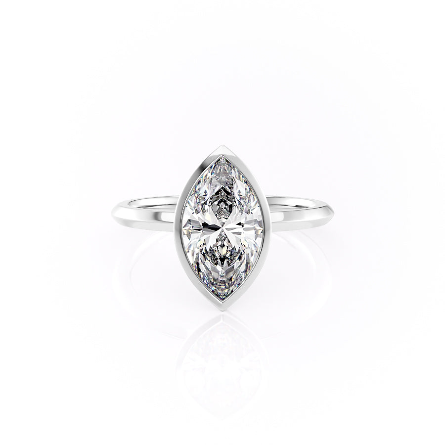 The Razor Bezel Kamellie Set With A 1.5 Carat Marquise Moissanite