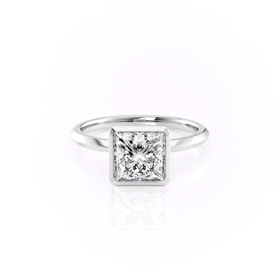 The Razor Bezel Kamellie Set With A 1.5 Carat Princess Moissanite