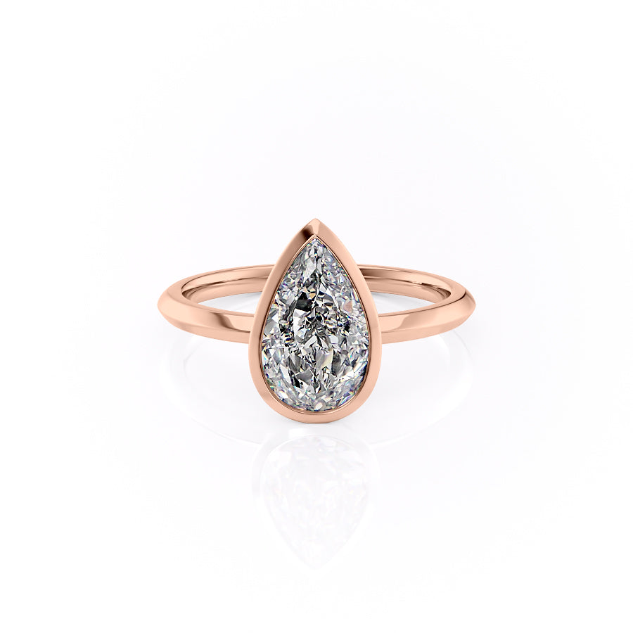 The Razor Bezel Kamellie Set With A 1.5 Carat Pear Moissanite