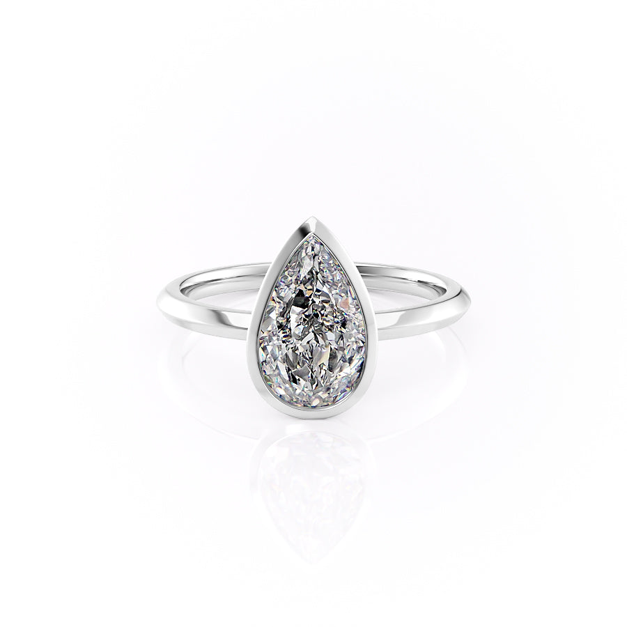 The Razor Bezel Kamellie Set With A Pear Moissanite