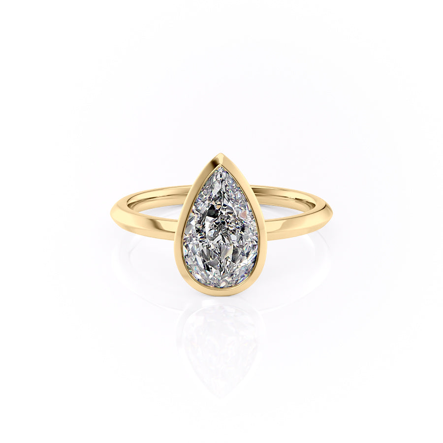The Razor Bezel Kamellie Set With A 1.5 Carat Pear Moissanite