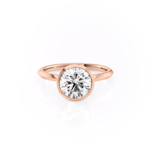 The Razor Bezel Kamellie Set With A Round Moissanite