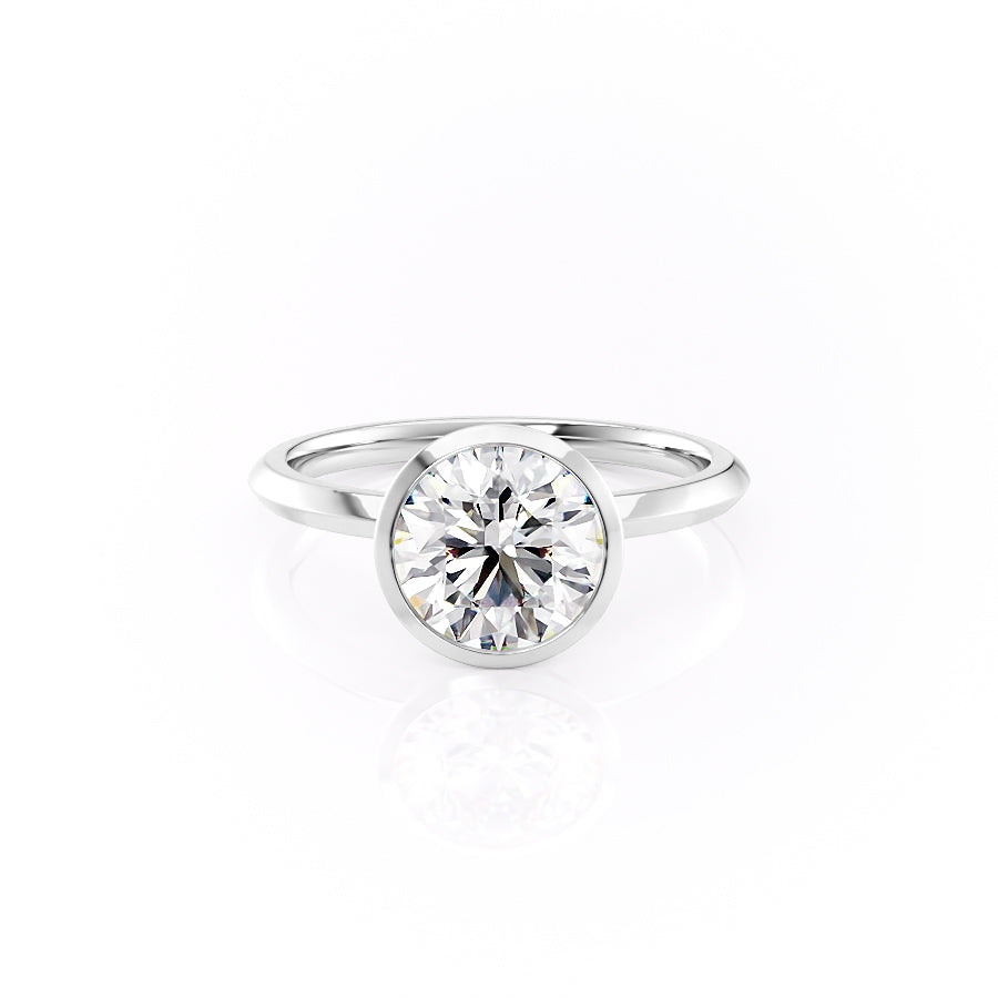 The Razor Bezel Kamellie Set With A Round Moissanite