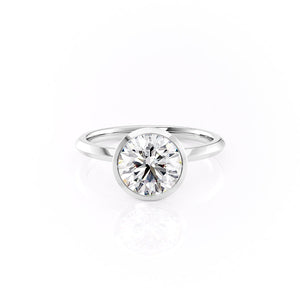 The Razor Bezel Kamellie Set With A Round Moissanite