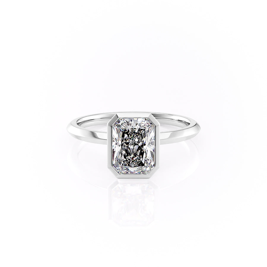 The Razor Bezel Kamellie Set With A Radiant Moissanite