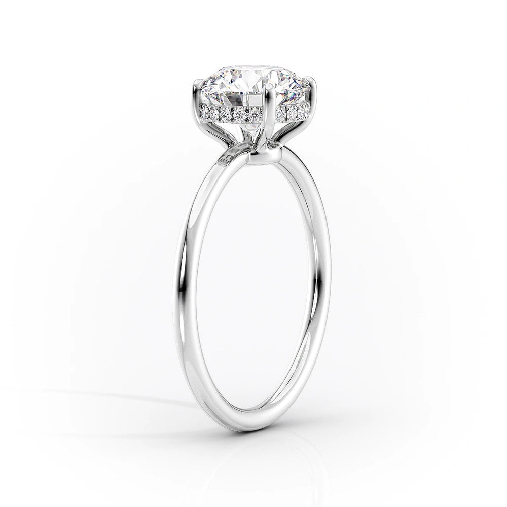 The Low Profile Kamellie Set With A 1.5 Carat Cushion Moissanite
