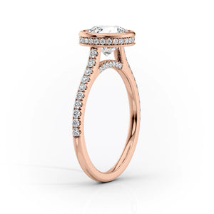 The Pave Charlotte Set With A 4.5 Carat Emerald Moissanite