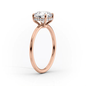 The Low Profile Kamellie Set With A 1.5 Carat Marquise Moissanite